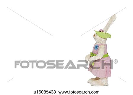 Stock Photo - Side view of stuffed Bunny standing over white background. Fotosearch
