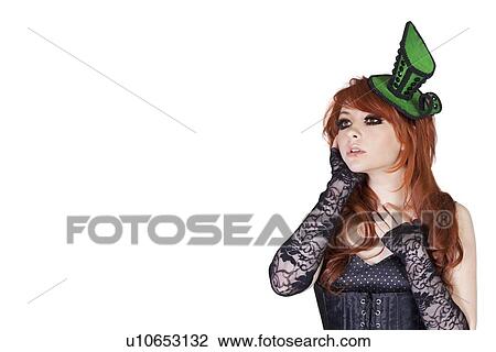 Teenage gothic girl looking away over white background View Large Photo Image Stock Image - Teenage gothic girl looking away over white background. Fotosearch