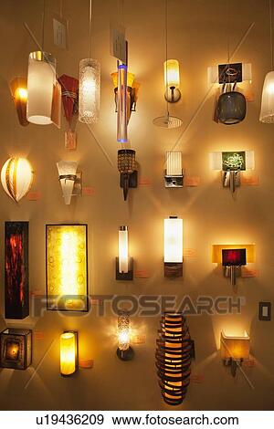 Wall lamps on display in lights store View Large Photo Image Stock Photo - Wall lamps on display in lights store. Fotosearch
