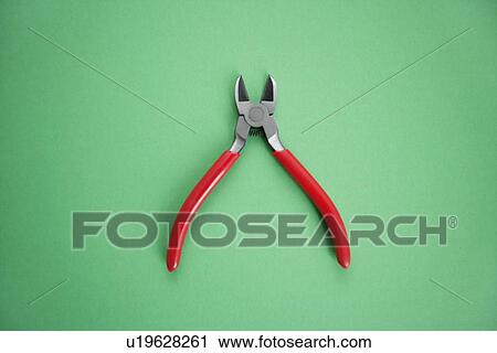 Stock Image - Work tool over colored background. Fotosearch