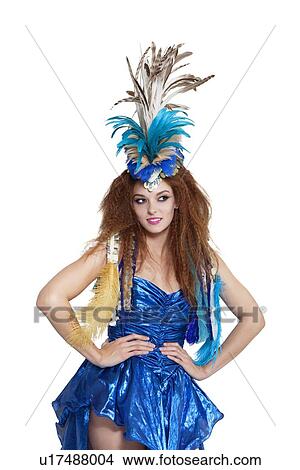 Picture - Young brunette posing with headgear over white background. Fotosearch