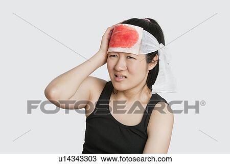 Young female with serious head injury View Large Photo Image Stock Image - Young female with serious head injury. Fotosearch