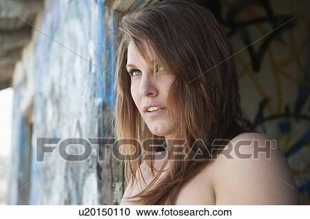 Attractive young woman looking away View Large Photo Image Stock Image - Attractive young woman looking away. Fotosearch