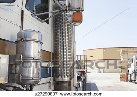 Close-up of flatbed truck in timber yard View Large Photo Image Stock Photo - Close-up of flatbed truck in timber yard. Fotosearch