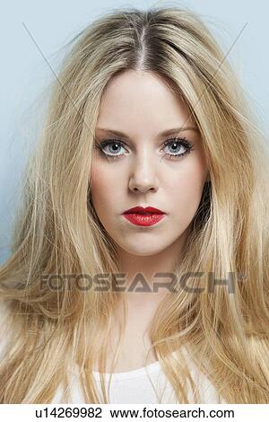 Close-up portrait of beautiful young woman with blond hair and red lips View Large Photo Image Stock Image - Close-up portrait of beautiful young woman with blond hair and red lips. Fotosearch