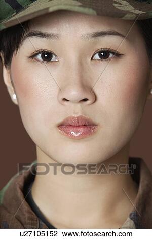 Stock Image - Close-up portrait of beautiful young US Marine Corps soldier. Fotosearch