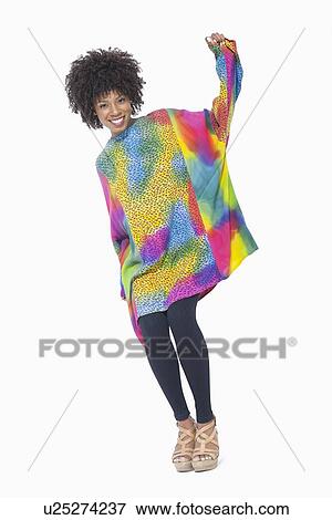 Full length portrait of an African American woman in dashiki standing over gray background View Large Photo Image Stock Photo - Full length portrait of an African American woman in dashiki standing over gray background. Fotosearch