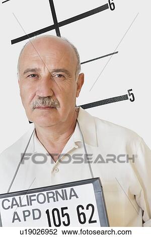 Stock Image - Mug shot of senior man. Fotosearch