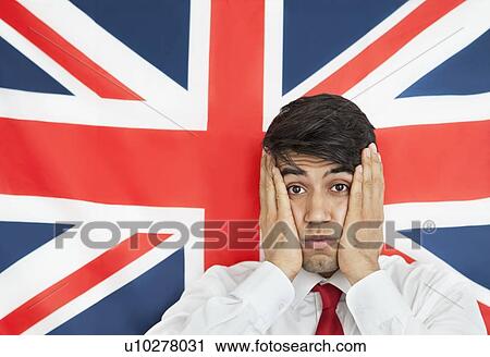 Portrait of a shocked Indian man with hands on cheeks against British flag View Large Photo Image Stock Image - Portrait of a shocked Indian man with hands on cheeks against British flag. Fotosearch