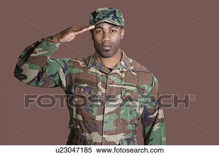 Portrait of a young African American US Marine Corps soldier saluting over brown background View Large Photo Image Stock Photography - Portrait of a young African American US Marine Corps soldier saluting over brown background. Fotosearch