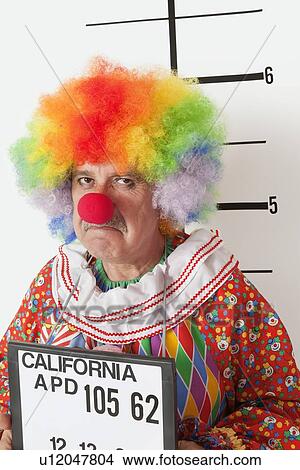 Portrait of angry senior clown during mug shot View Large Photo Image Picture - Portrait of angry senior clown during mug shot. Fotosearch