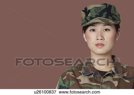Portrait of beautiful young US Marine Corps soldier over brown background View Large Photo Image Stock Photo - Portrait of beautiful young US Marine Corps soldier over brown background. Fotosearch