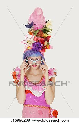 Portrait of beautiful young woman in Brazilian outfit over gray background View Large Photo Image Stock Photo - Portrait of beautiful young woman in Brazilian outfit over gray background. Fotosearch