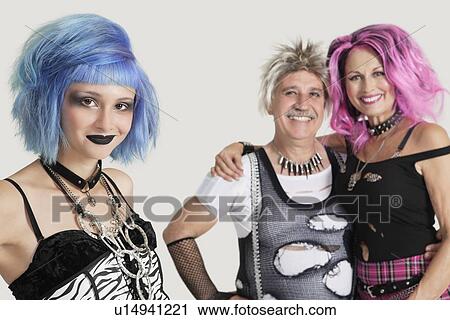 Portrait of punk male and females over gray background View Large Photo Image Stock Image - Portrait of punk male and females over gray background. Fotosearch