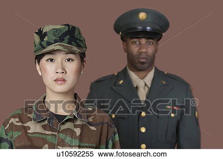 Portrait of young female US Marine Corps soldier with male officer in background View Large Photo Image Stock Photography - Portrait of young female US Marine Corps soldier with male officer in background. Fotosearch