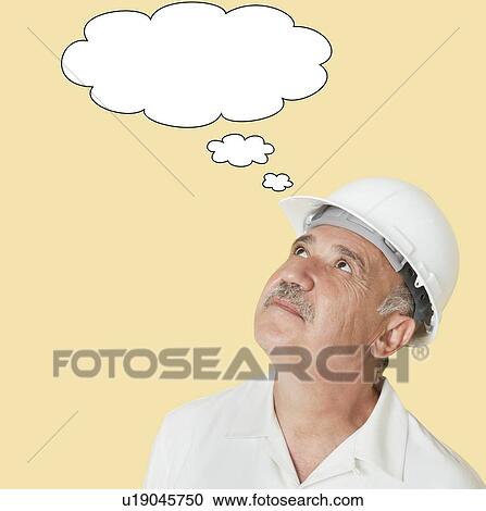 Senior construction worker with hardhat looking up over yellow background View Large Photo Image Stock Image - Senior construction worker with hardhat looking up over yellow background. Fotosearch