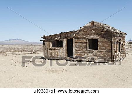 Timber home on arid landscape View Large Photo Image Stock Image - Timber home on arid landscape. Fotosearch