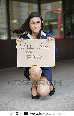 Young Indian businesswoman holding 'Will Work for Food' sign View Large Photo Image Stock Photography - Young Indian businesswoman holding 'Will Work for Food' sign. Fotosearch