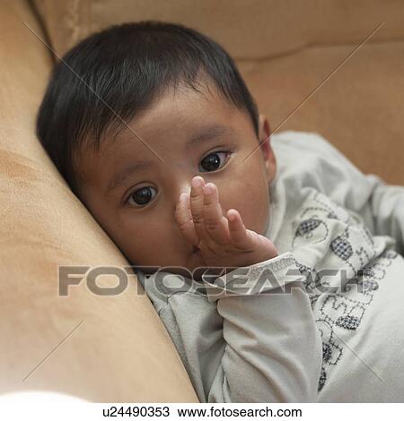 Baby sucking thumb, San Jose Pinula, Guatemala City, Guatemala View Large Photo Image Stock Image - Baby sucking thumb, San Jose Pinula, Guatemala City, Guatemala. Fotosearch