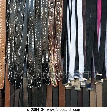Picture - Belts for sale at a market stall, Zona 1, Guatemala City, Guatemala. Fotosearch