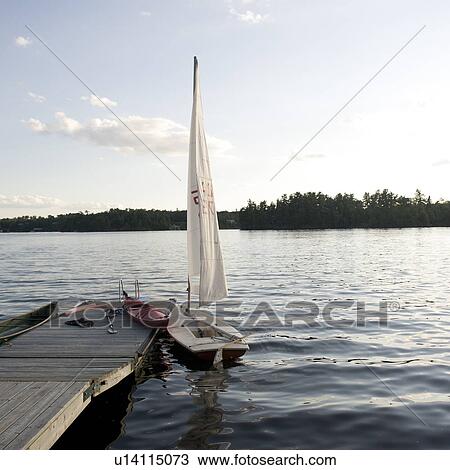 Boats at a dock, Lake of the Woods, Ontario, Canada View Large Photo Image Stock Image - Boats at a dock, Lake of the Woods, Ontario, Canada. Fotosearch