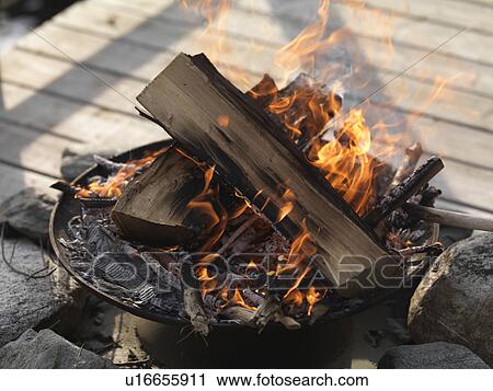 Stock Image - Campfire, Lake of the Woods, Ontario, Canada. Fotosearch