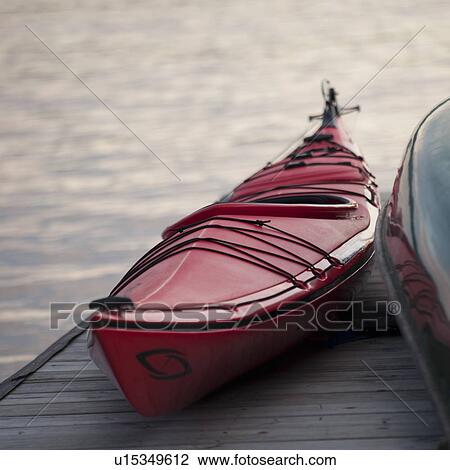 Canoe at a dock, Lake of the Woods, Ontario, Canada View Large Photo Image Stock Image - Canoe at a dock, Lake of the Woods, Ontario, Canada. Fotosearch