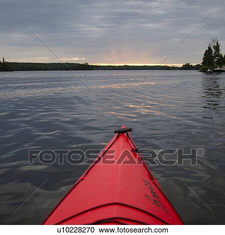 Canoe in a lake, Lake of the Woods, Ontario, Canada View Large Photo Image Stock Image - Canoe in a lake, Lake of the Woods, Ontario, Canada. Fotosearch