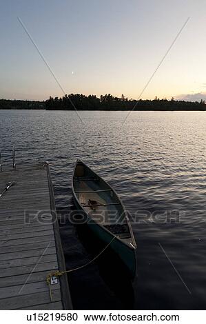 Canoe moored at a dock, Lake of the Woods, Ontario, Canada View Large Photo Image Stock Image - Canoe moored at a dock, Lake of the Woods, Ontario, Canada. Fotosearch