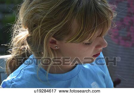 Close-up of a girl, Lake of the Woods, Ontario, Canada View Large Photo Image Stock Photo - Close-up of a girl, Lake of the Woods, Ontario, Canada. Fotosearch