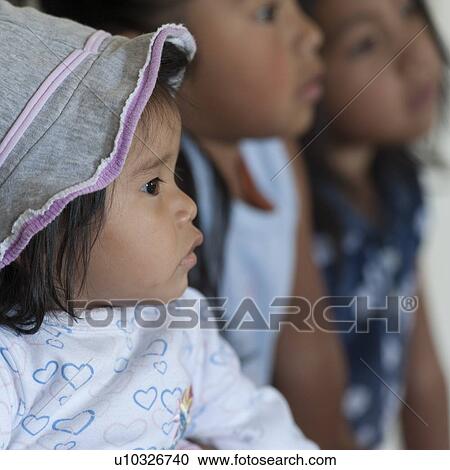 Close-up of a girl staring, Colonia Bethania, Guatemala City, Guatemala View Large Photo Image Stock Image - Close-up of a girl staring, Colonia Bethania, Guatemala City, Guatemala. Fotosearch