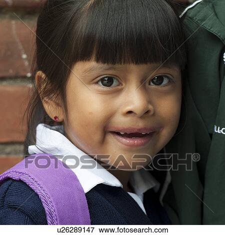 Stock Photo - Close-up of a schoolgirl, Guatemala City, Guatemala. Fotosearch