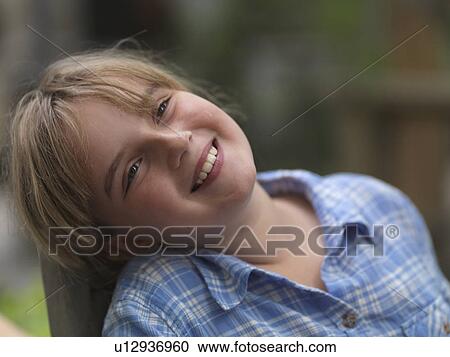 Close-up of a teenage girl smiling, Lake of the Woods, Ontario, Canada View Large Photo Image Stock Image - Close-up of a teenage girl smiling, Lake of the Woods, Ontario, Canada. Fotosearch