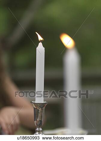 Close-up of burning candle, Lake of the Woods, Ontario, Canada View Large Photo Image Stock Image - Close-up of burning candle, Lake of the Woods, Ontario, Canada. Fotosearch