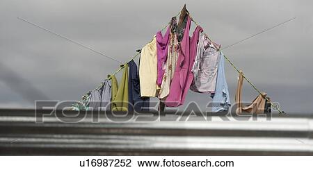 Stock Image - Clothes drying on a clothesline, Zona 3, Guatemala City, Guatemala. Fotosearch