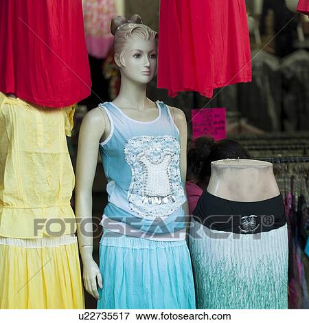 Stock Photo - Dresses and mannequins in a clothing store, Zona 1, Guatemala City, Guatemala. Fotosearch