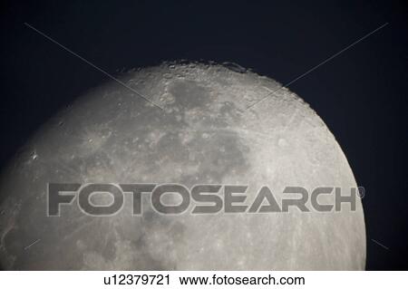 Stock Image - Full moon in the sky, Lake of the Woods, Ontario, Canada. Fotosearch