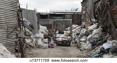 Stock Photo - Garbage dump, Colonia Landivar, Guatemala City, Guatemala. Fotosearch