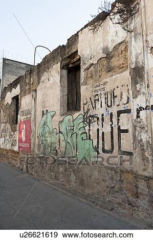 Stock Photo - Graffiti on a ruined wall, Zona 1, Guatemala City, Guatemala. Fotosearch