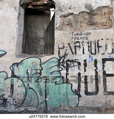 Stock Photograph - Graffiti on a ruined wall, Zona 1, Guatemala City, Guatemala. Fotosearch