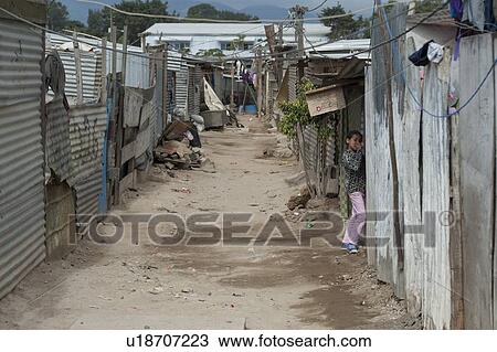 Stock Image - Houses made with corrugated iron in a slum area, Zona 3, Guatemala City, Guatemala. Fotosearch