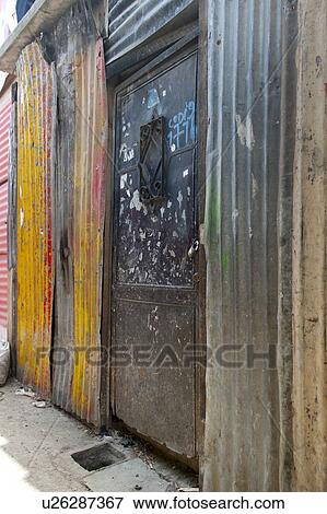 Stock Photo - Houses made with corrugated iron in a slum area, Colonia Landivar, Guatemala City, Guatemala. Fotosearch