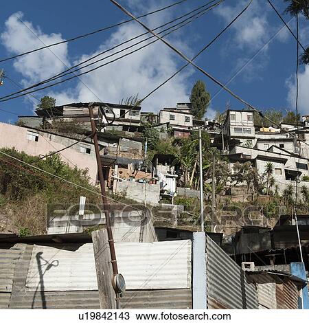 Stock Image - Houses on a hill, Colonia Bethania, Guatemala City, Guatemala. Fotosearch
