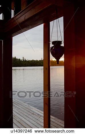 Lake viewed through the glass of a door, Lake of the Woods, Ontario, Canada View Large Photo Image Stock Photograph - Lake viewed through the glass of a door, Lake of the Woods, Ontario, Canada. Fotosearch