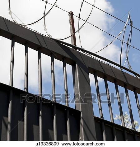 Stock Photo - Low angle view of a fence, Colonia Oakland, Guatemala City, Guatemala. Fotosearch