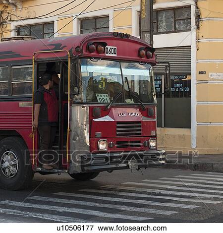 Passengers traveling in a bus, Zona 1, Guatemala City, Guatemala View Large Photo Image Stock Photo - Passengers traveling in a bus, Zona 1, Guatemala City, Guatemala. Fotosearch