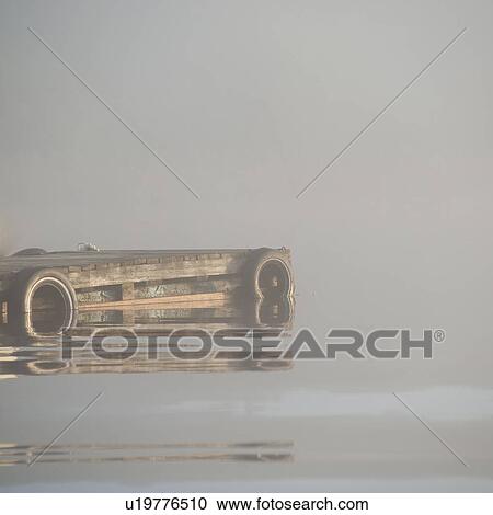 Stock Image - Pier in a lake, Lake of the Woods, Ontario, Canada. Fotosearch