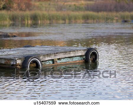 Pier in a lake, Lake of the Woods, Ontario, Canada View Large Photo Image Stock Photo - Pier in a lake, Lake of the Woods, Ontario, Canada. Fotosearch