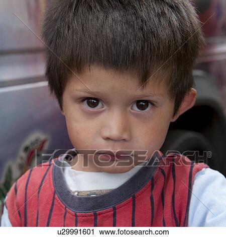 Stock Image - Portrait of a boy, Colonia Landivar, Guatemala City, Guatemala. Fotosearch