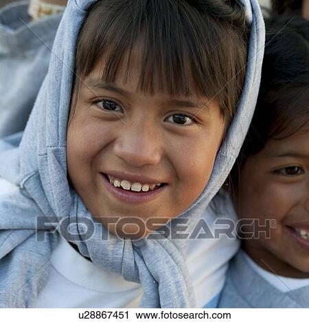 Stock Image - Portrait of a girl smiling, San Jose Pinula, Guatemala City, Guatemala. Fotosearch